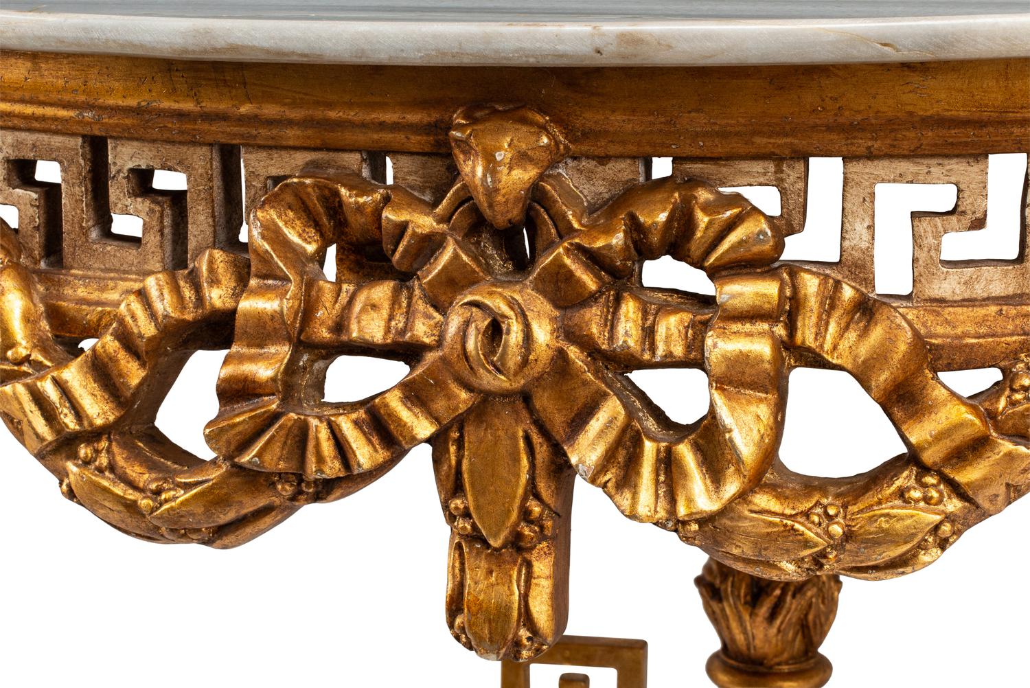 A Pair of Italian Neoclassical Style White Painted and Parcel Gilt Marble-Top Console Tables