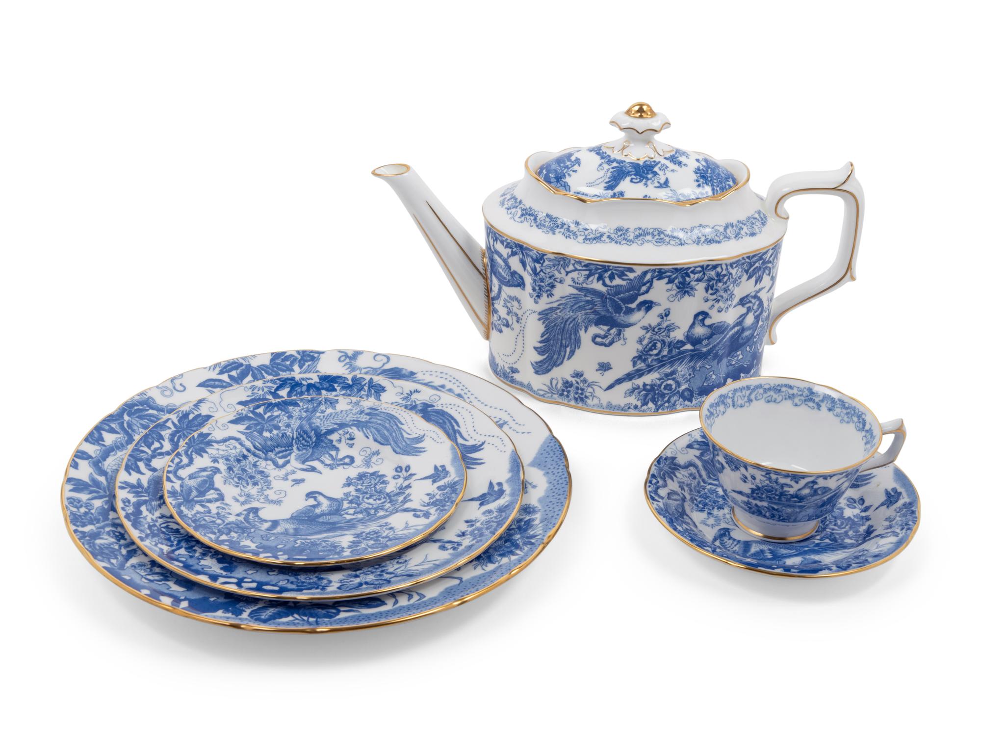 A Royal Crown Derby Porcelain Blue Aves Dinner Service