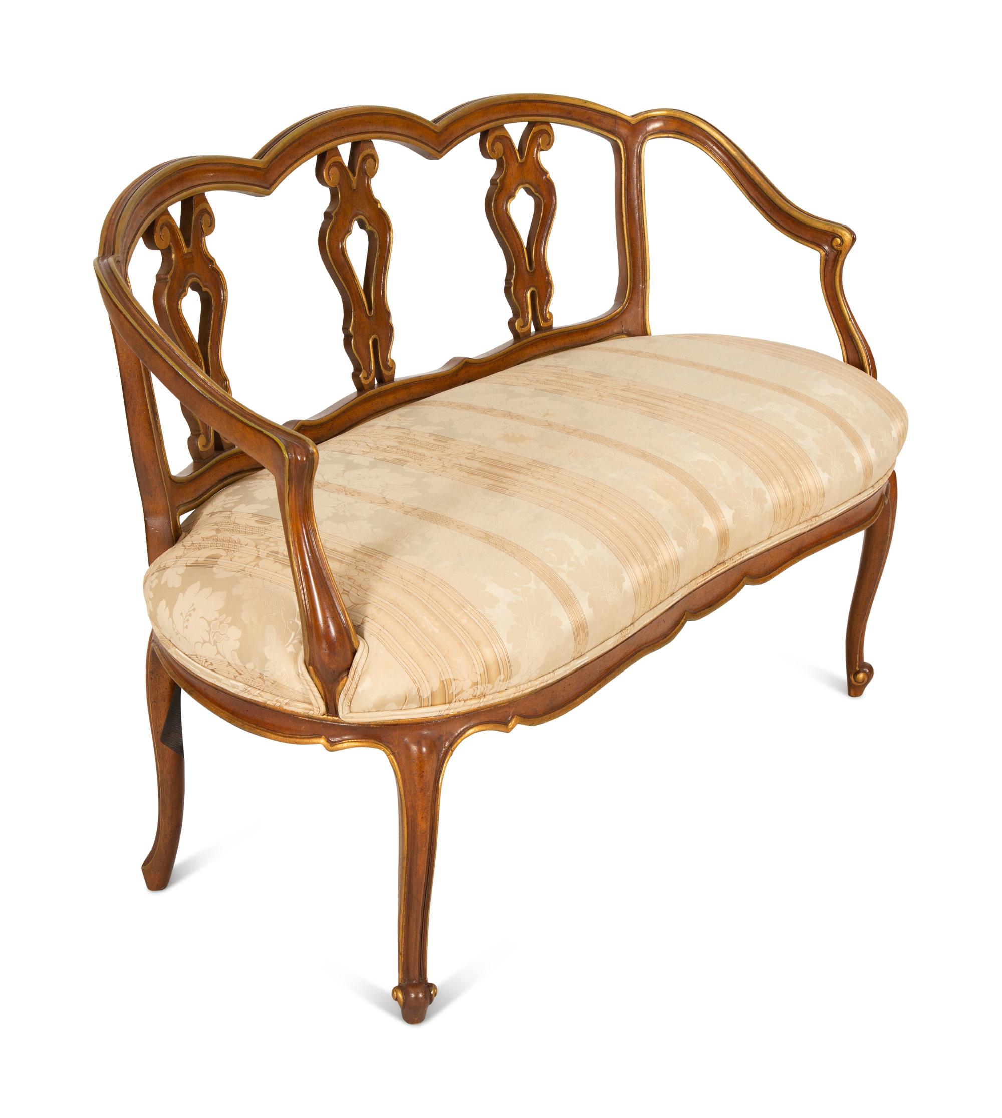 A Continental Painted and Giltwood Settee