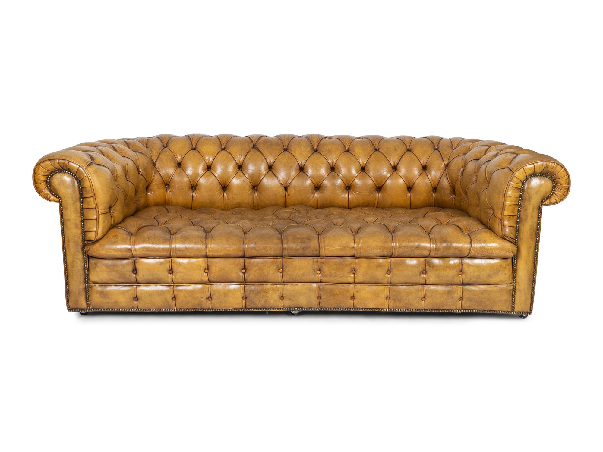 An English Edwardian Tufted Leather Chesterfield Sofa — 20TH CENTURY