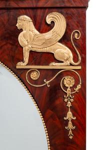 An Empire Style Gilt Metal Mounted Mahogany Mirror