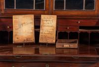 A Chippendale Mahogany and Cherrywood Serpentine Claw-and-Ball Foot Desk-and-Bookcase
