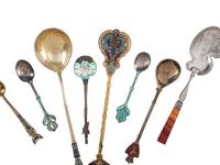 Seventeen Enameled Silver and Silver Gilt Serving Spoons and Souvenir Spoons