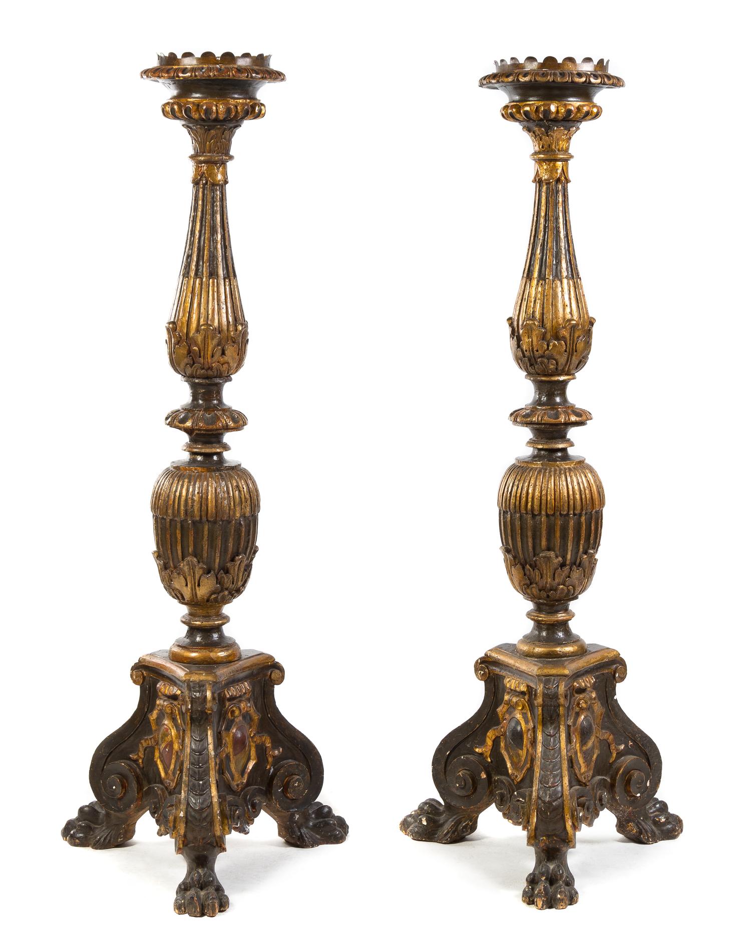 A Pair of Neoclassical Style Parcel Gilt Prickets Height 71 inches.