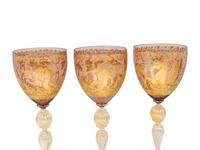 A Venetian Gilt Decorated Glass Stemware Service