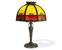 An American Arts & Crafts brass and slag glass table lamp, circa 1920