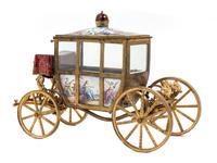 A Viennese Enameled Gilt Metal Musical Model of a Coach Height 7 1/4 inches. — 19TH CENTURY