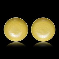 A Pair of Chinese Yellow Glazed Incised Porcelain 'Dragon' Dishes, Qianlong Marks and of the Period 清乾隆 嬌黃釉龍紋碟一對
