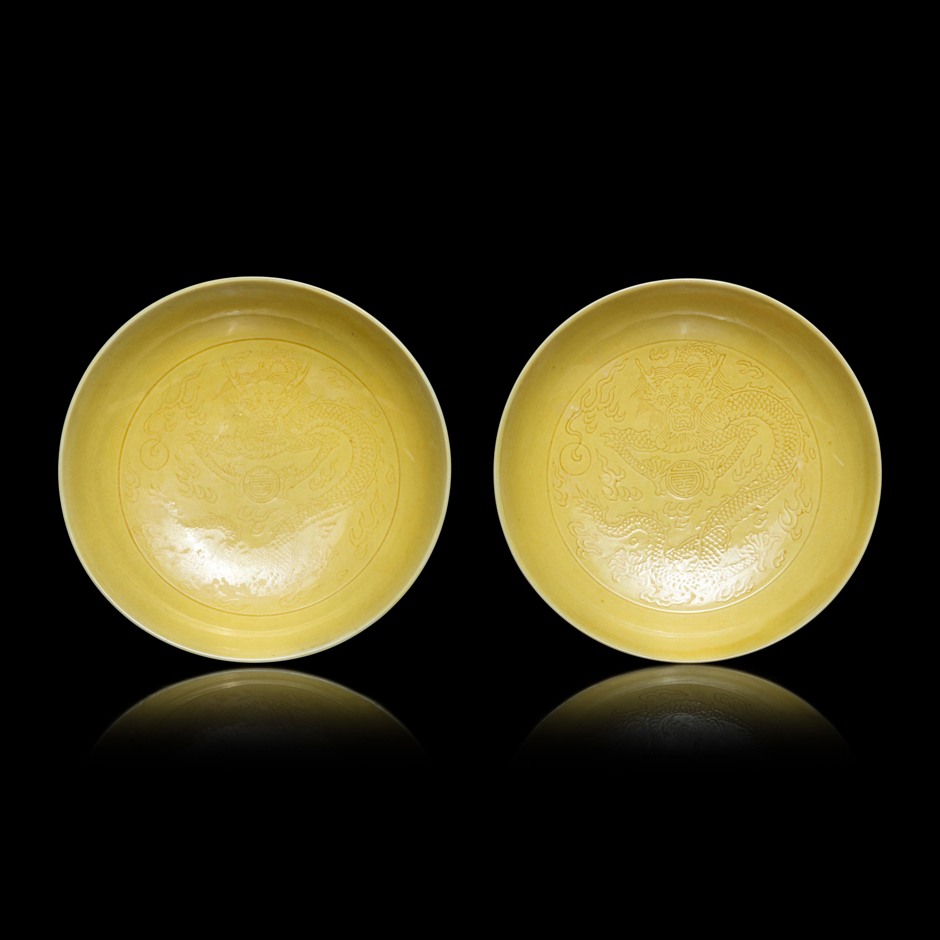 A Pair of Chinese Yellow Glazed Incised Porcelain 'Dragon' Dishes, Qianlong Marks and of the Period 清乾隆 嬌黃釉龍紋碟一對