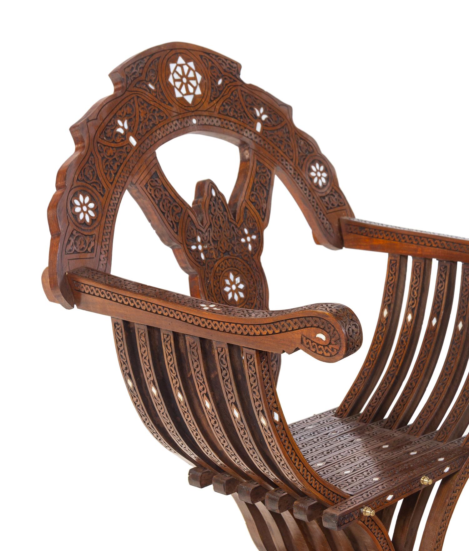 A Pair of Syrian Mother-of-Pearl Inlaid Walnut Savonarola Chairs
