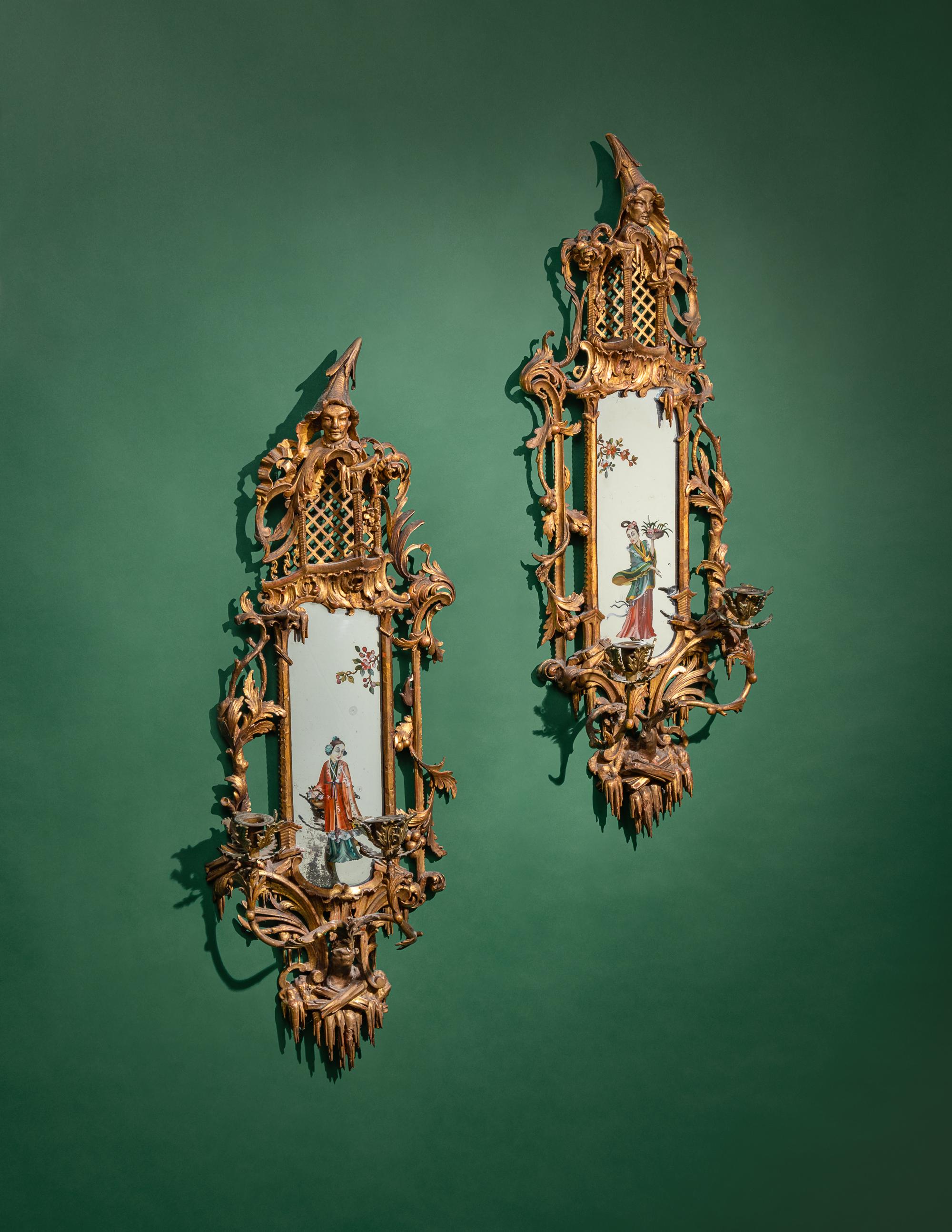 A Pair of Chinese Chippendale Giltwood and Reverse-Painted Glass Mirrors