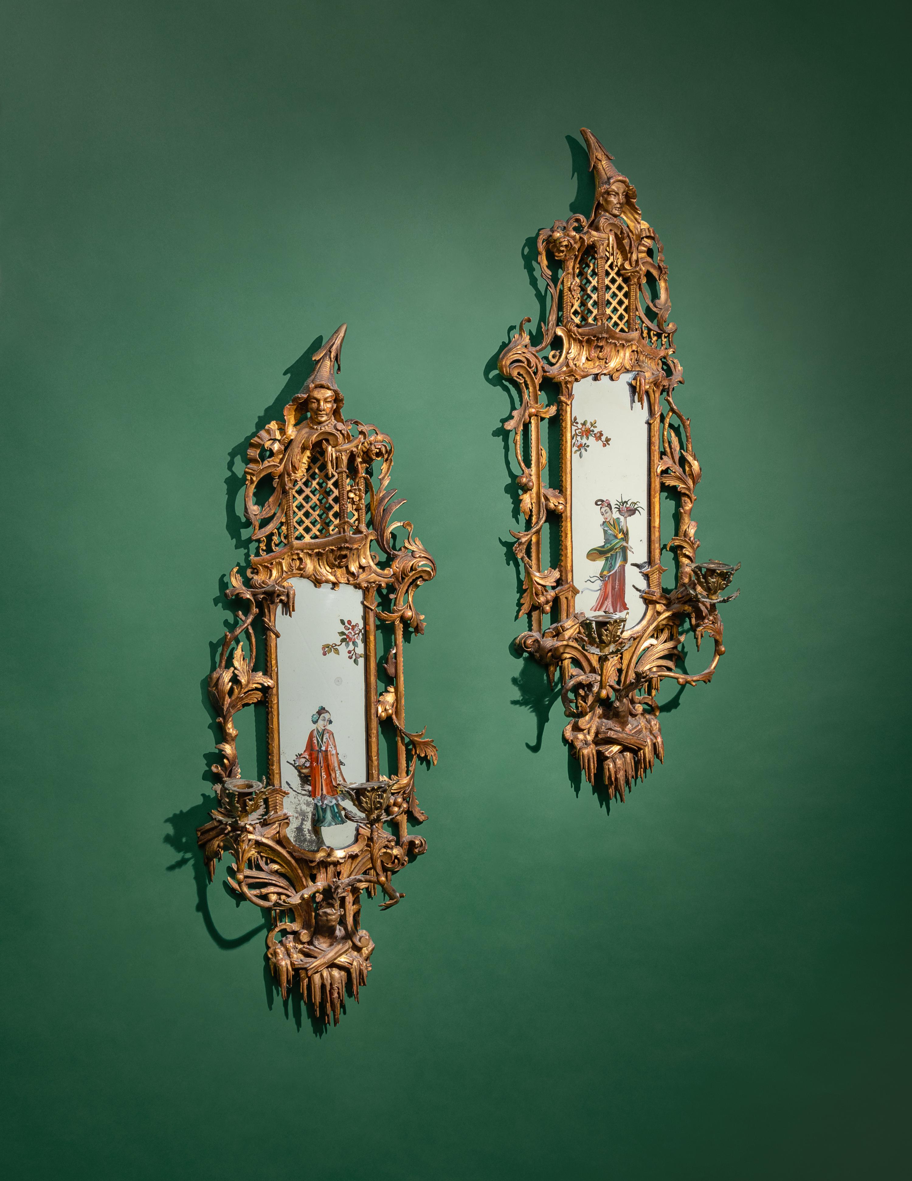 A Pair of Chinese Chippendale Giltwood and Reverse-Painted Glass Mirrors