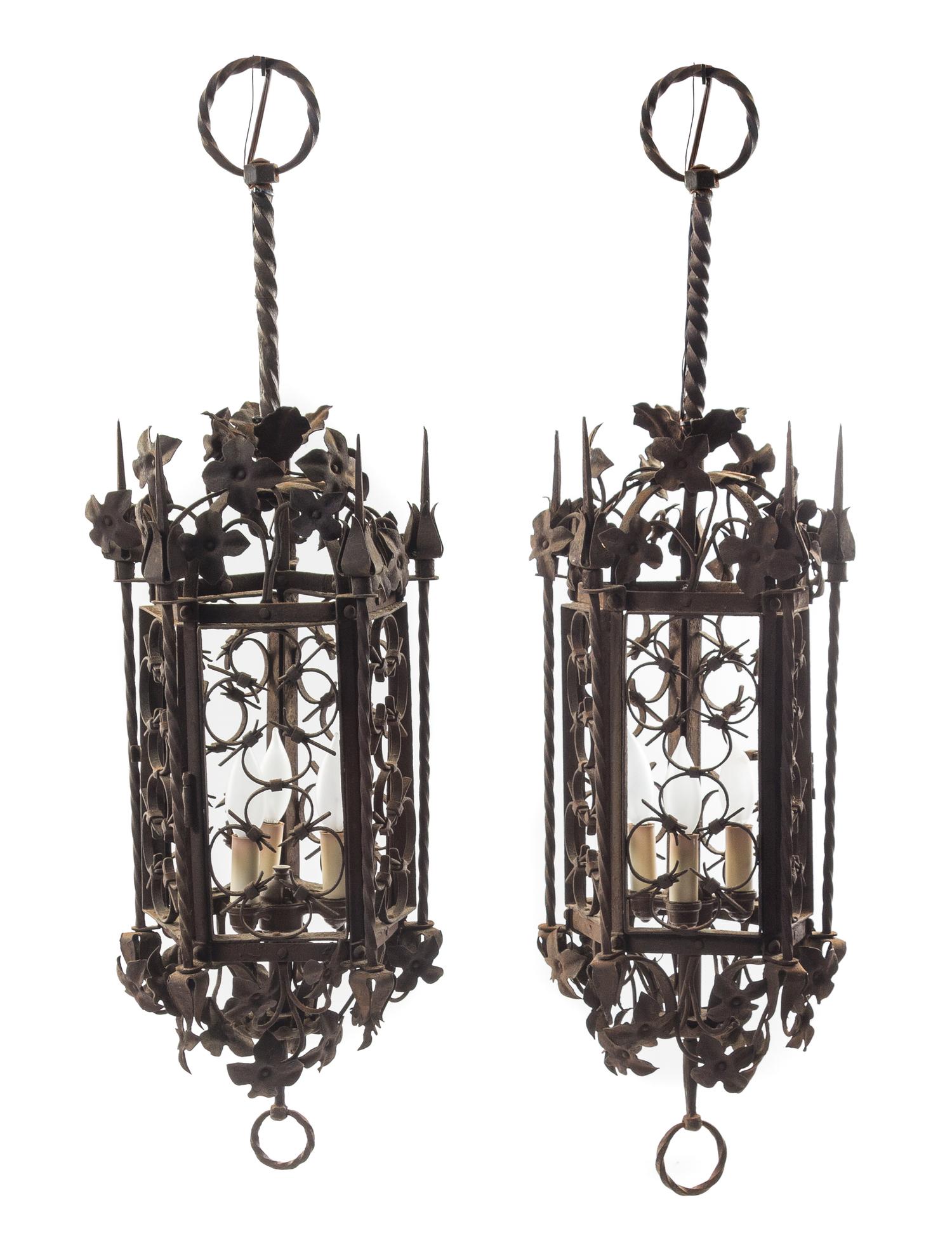 A Pair of Gothic Style Wrought Iron Lanterns Height 35 inches. — STYLE OF ADDISON MIZNER