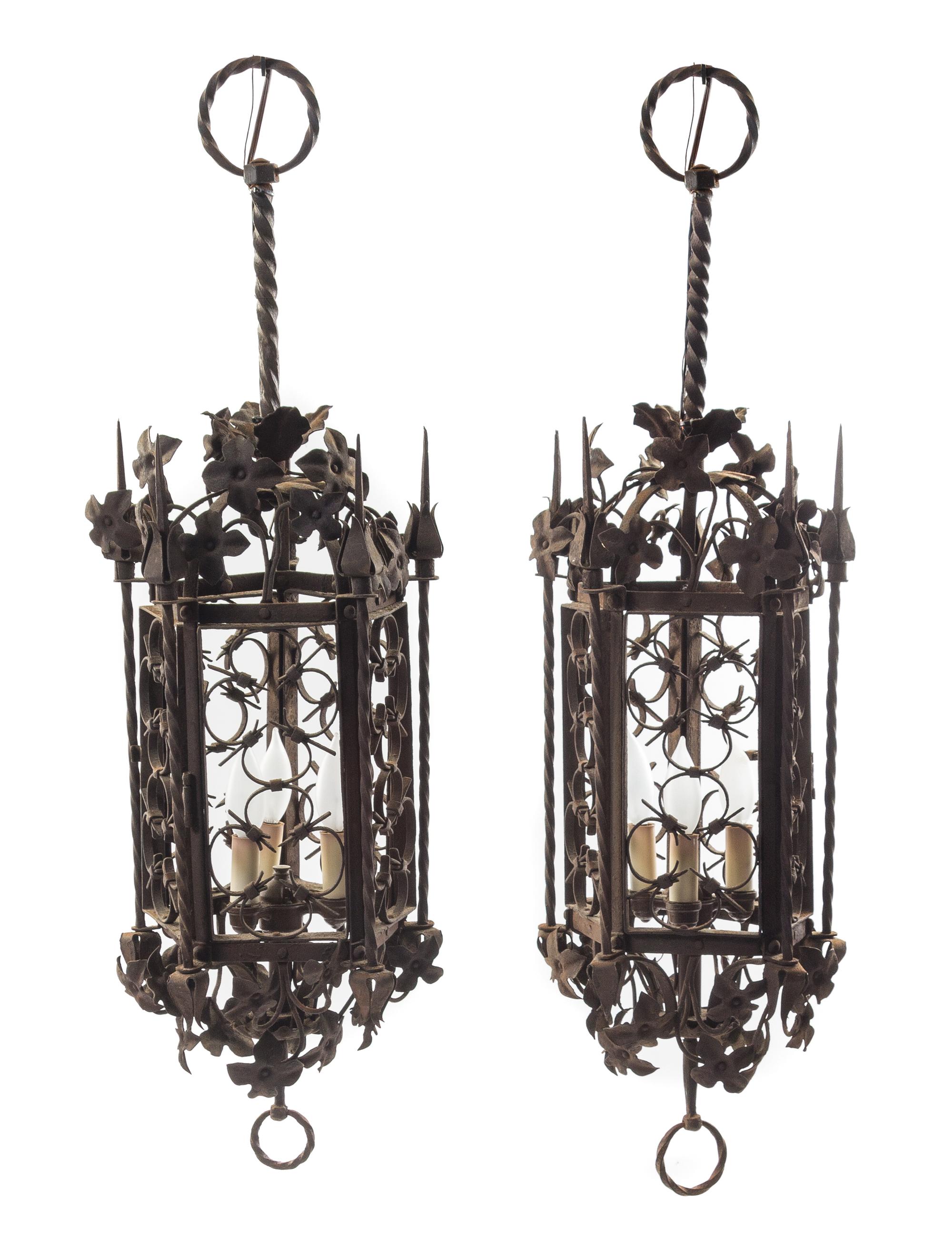 A Pair of Gothic Style Wrought Iron Lanterns Height 35 inches. — STYLE OF ADDISON MIZNER