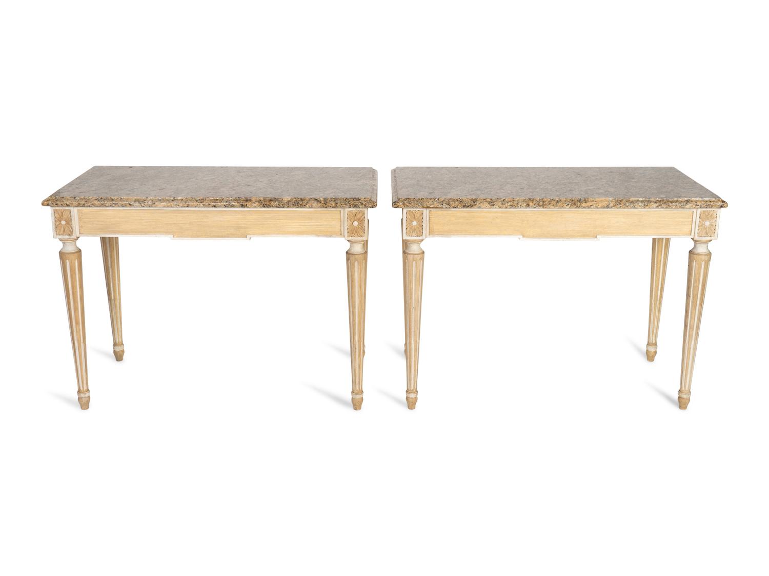 A Pair of Neoclassical Carved and Painted Console Tables with Granite Tops — 20TH CENTURY