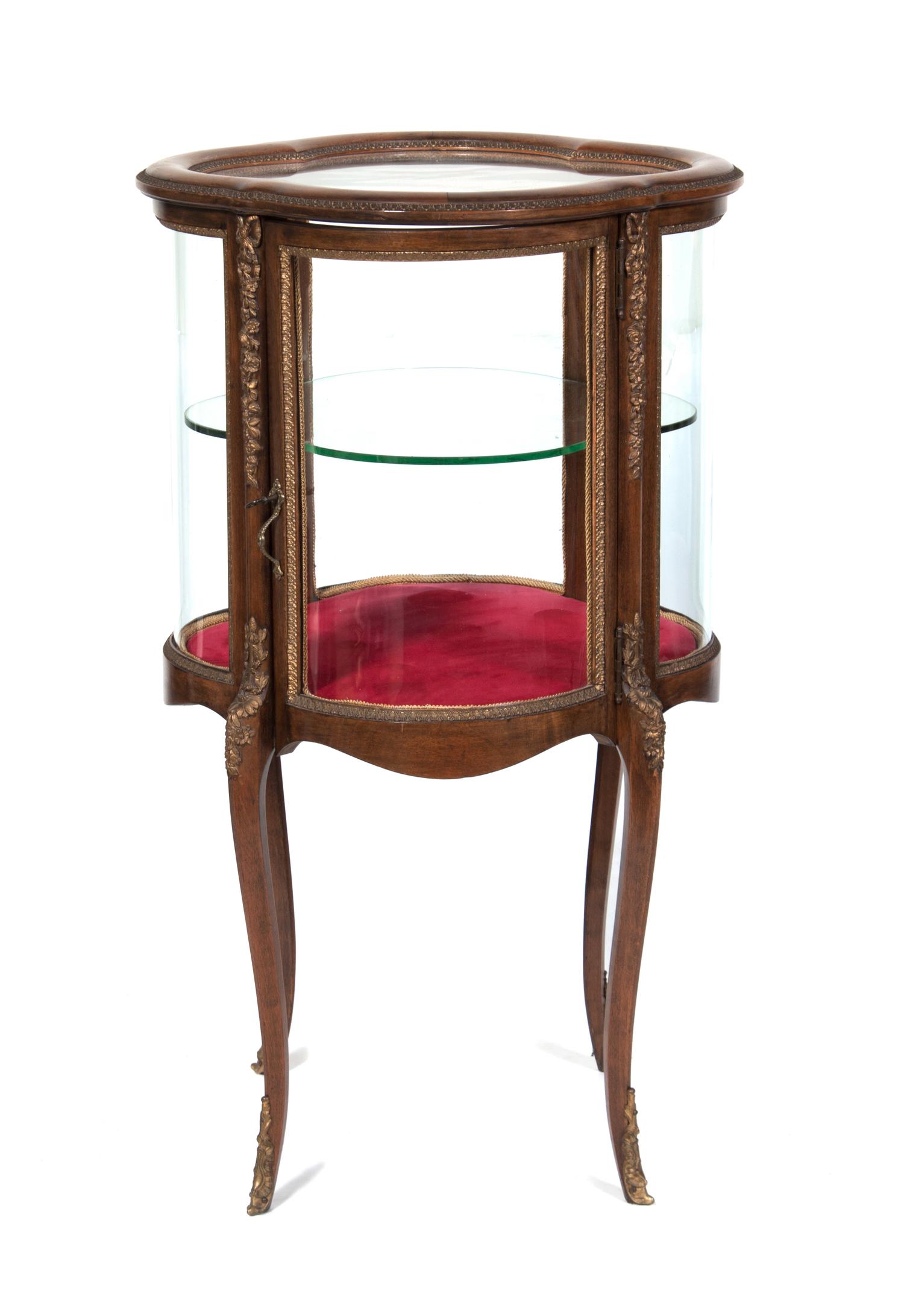 A Gilt Metal Mounted Vitrine Height 37 1/2 inches.