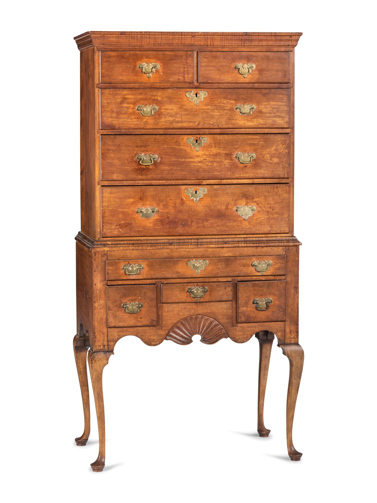 A Queen Anne Stained and Fan-Carved Cherrywood and Tiger Maple Flat-Top High Chest