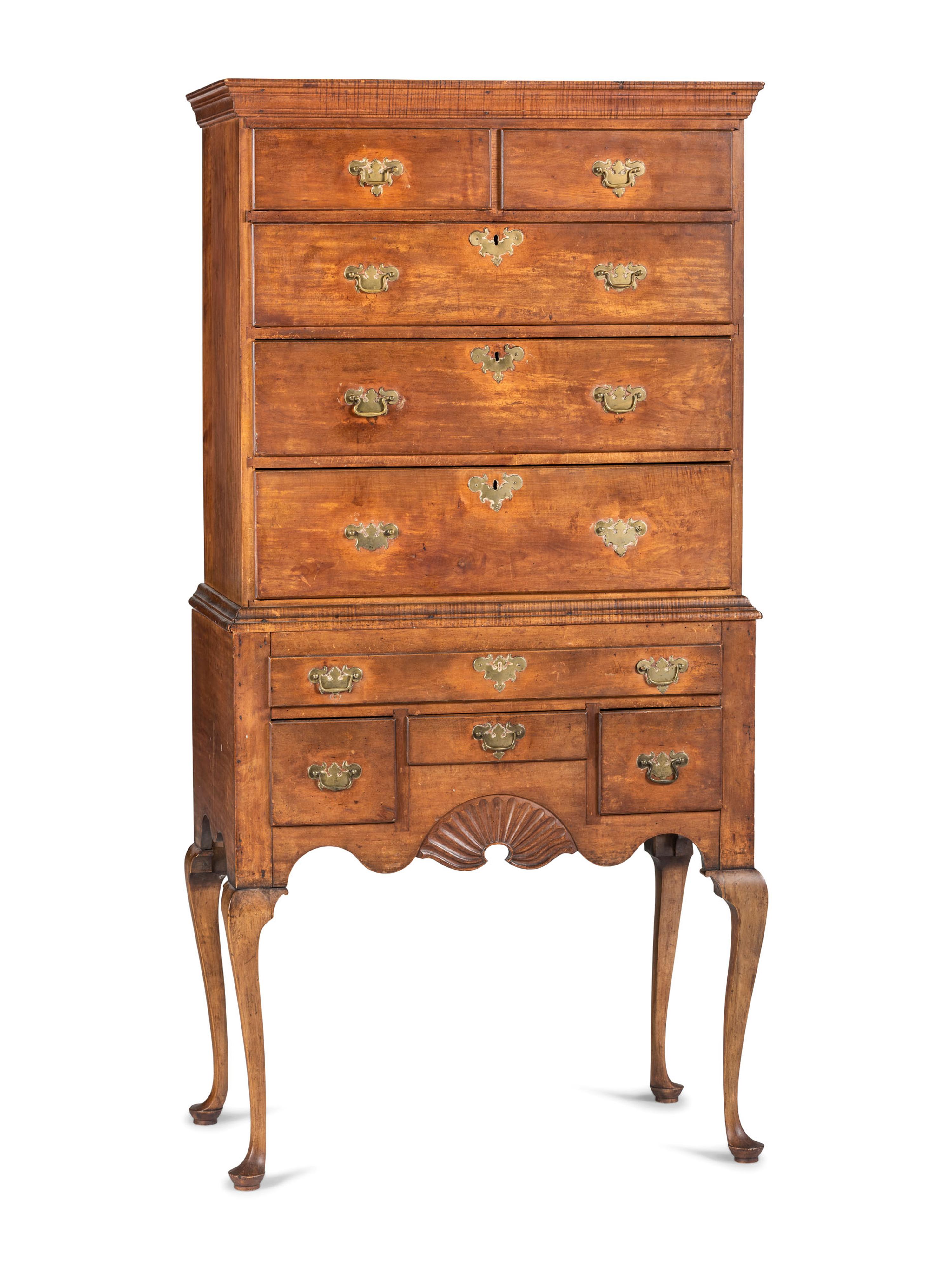 A Queen Anne Stained and Fan-Carved Cherrywood and Tiger Maple Flat-Top High Chest