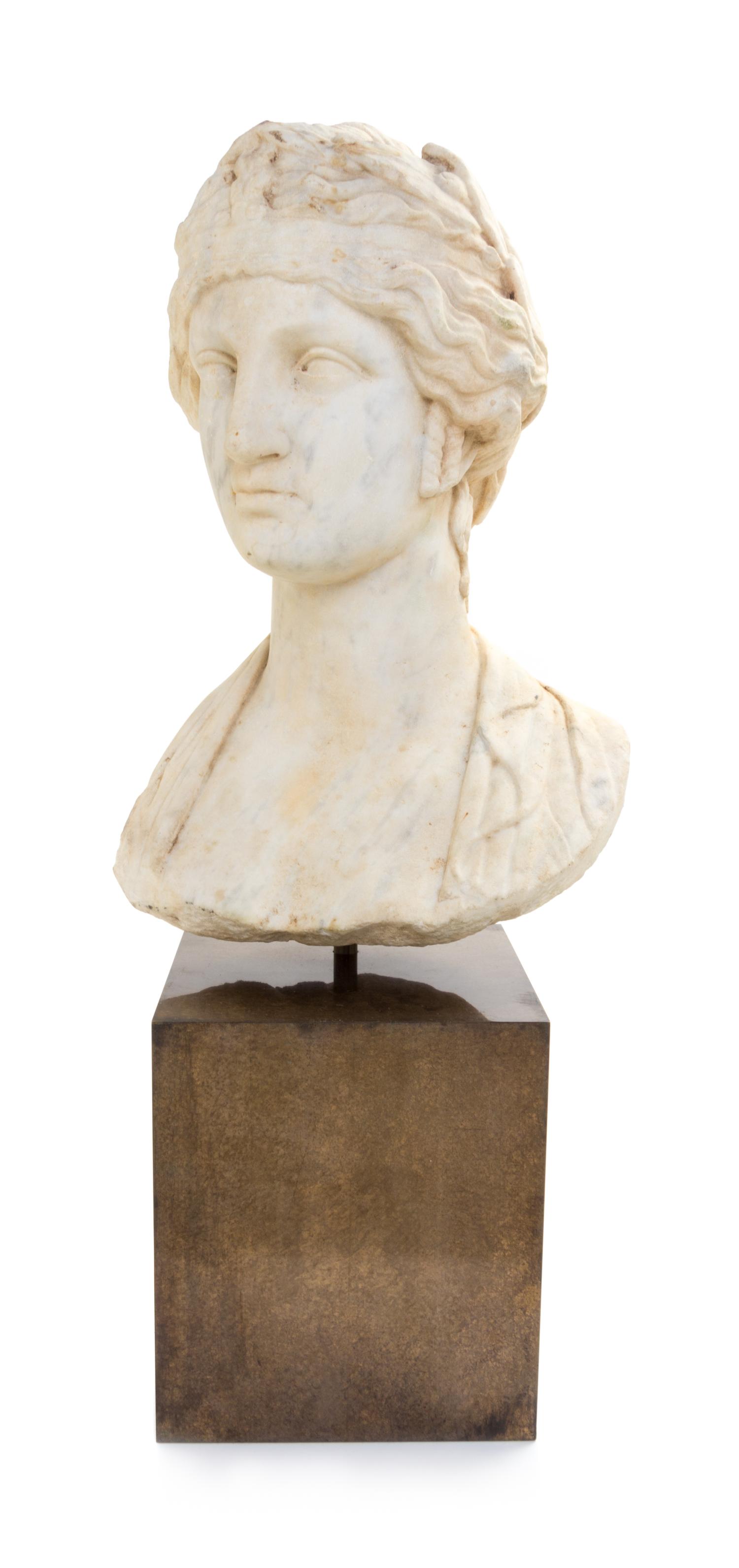 An Italian Marble Head of Minerva Height 15 1/2 inches. — 18TH/19TH CENTURY