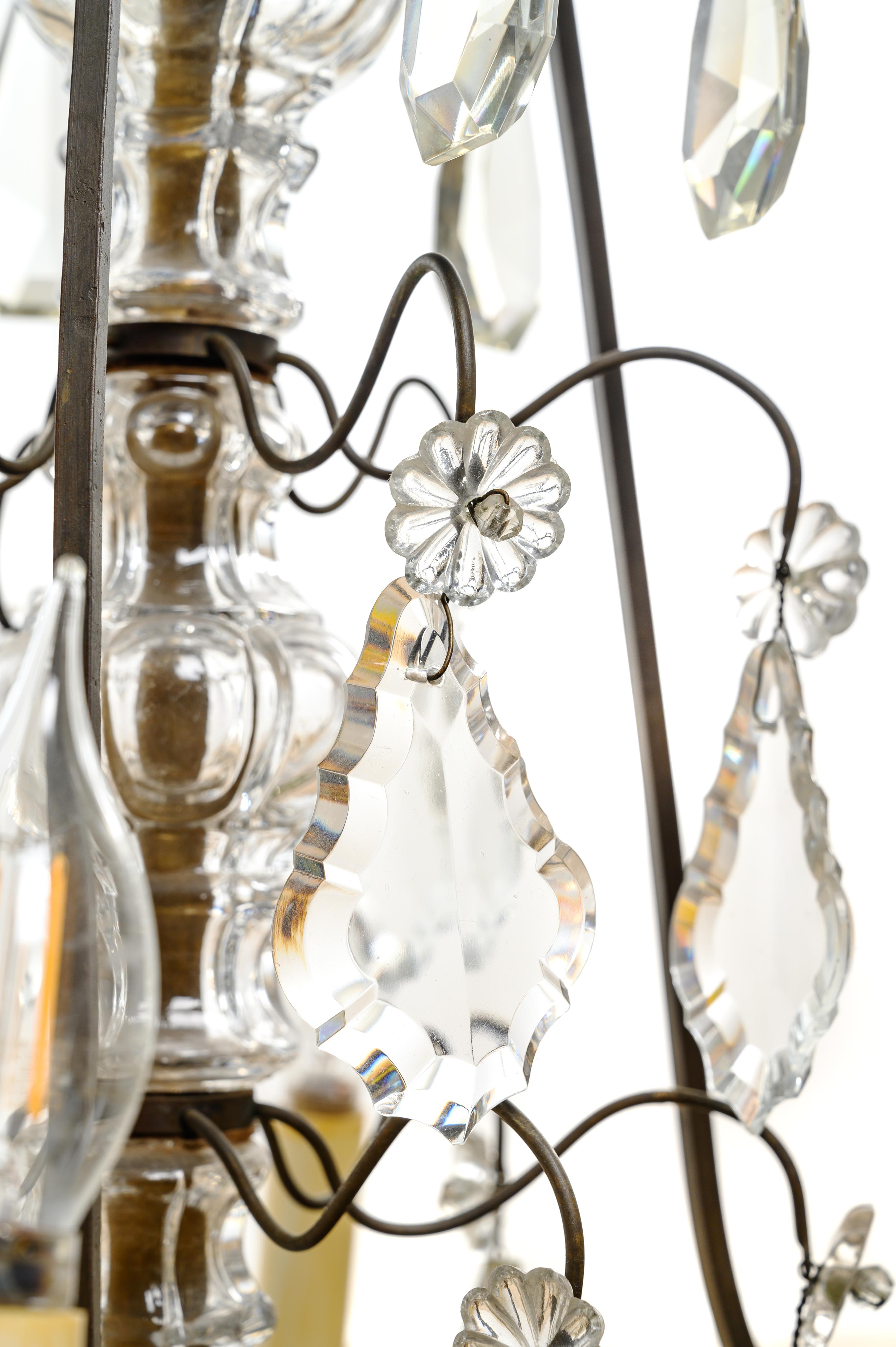A Continental Cast Metal and Cut Glass Six-Light Chandelier