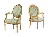 A Set of Four Louis XVI Style Carved Giltwood Fauteuils