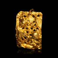 A Pair of Chinese Gold 'Figural and Fruits' Plaque Earrings, Paihuan, Qing Dynasty 清 童子瓜果紋 金 牌環一對
