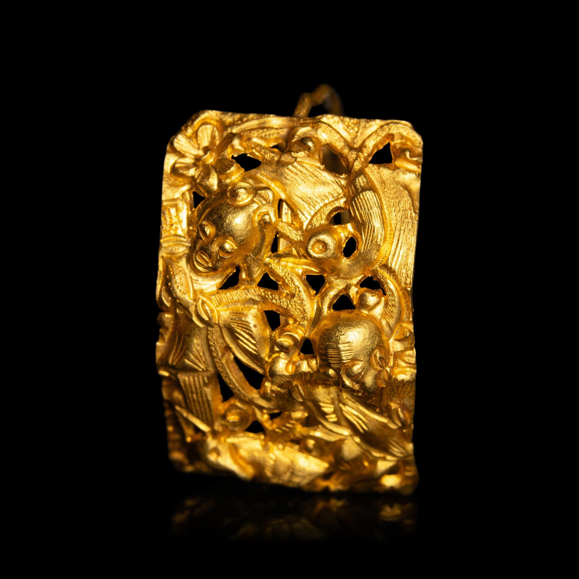 A Pair of Chinese Gold 'Figural and Fruits' Plaque Earrings, Paihuan, Qing Dynasty 清 童子瓜果紋 金 牌環一對