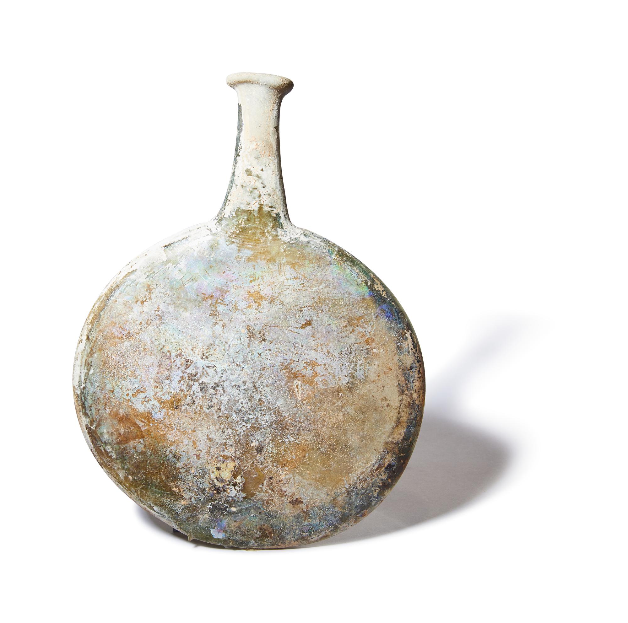 A Roman Green Glass Pilgrim Flask