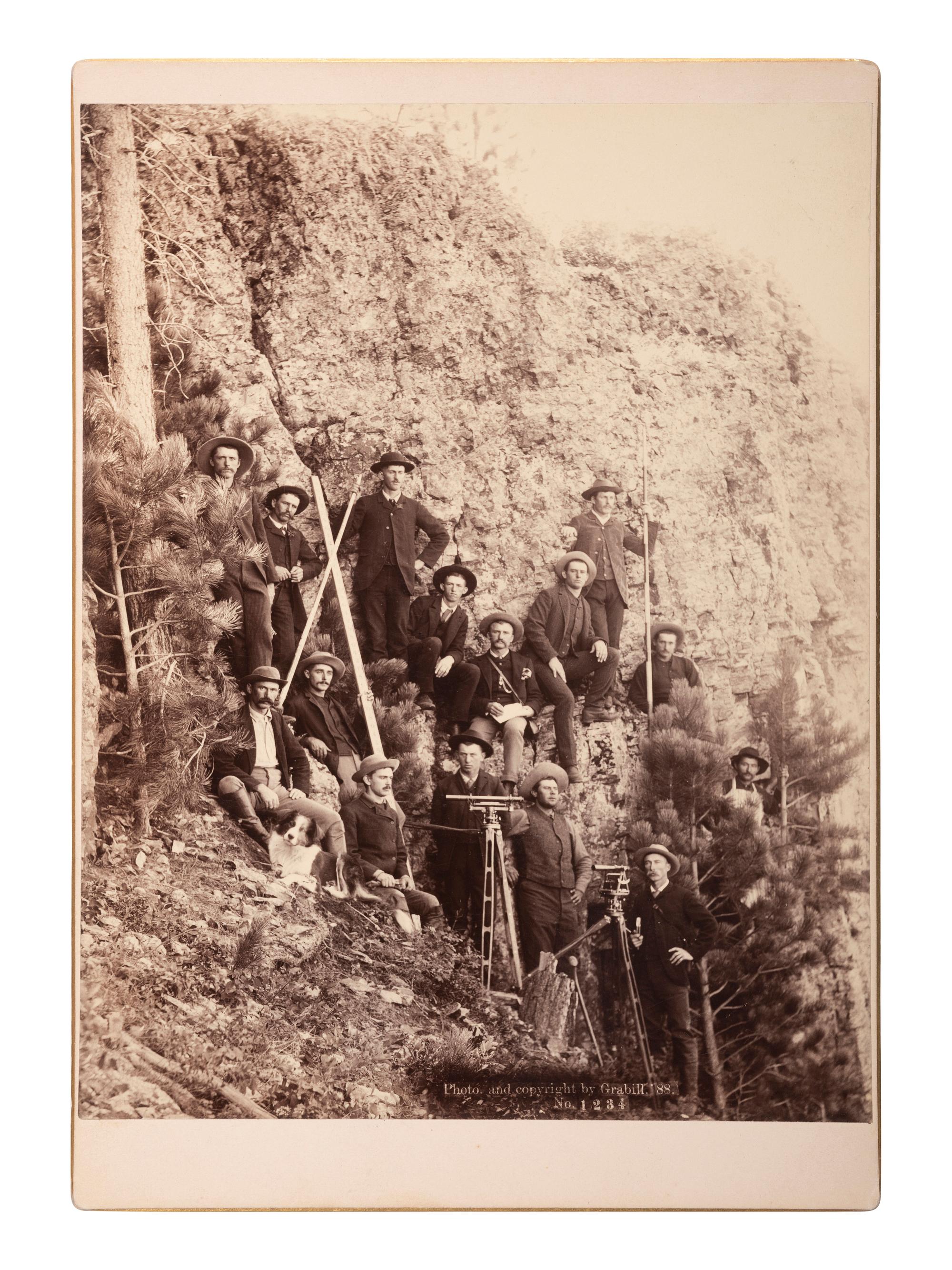 [WESTERN AMERICANA]. A group of 2 photographs of surveyors with equipment, incl. example by John C.H. GRABILL, South Dakota, 1888.