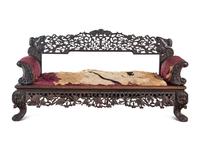 A Chinese Export Carved Hardwood Sofa