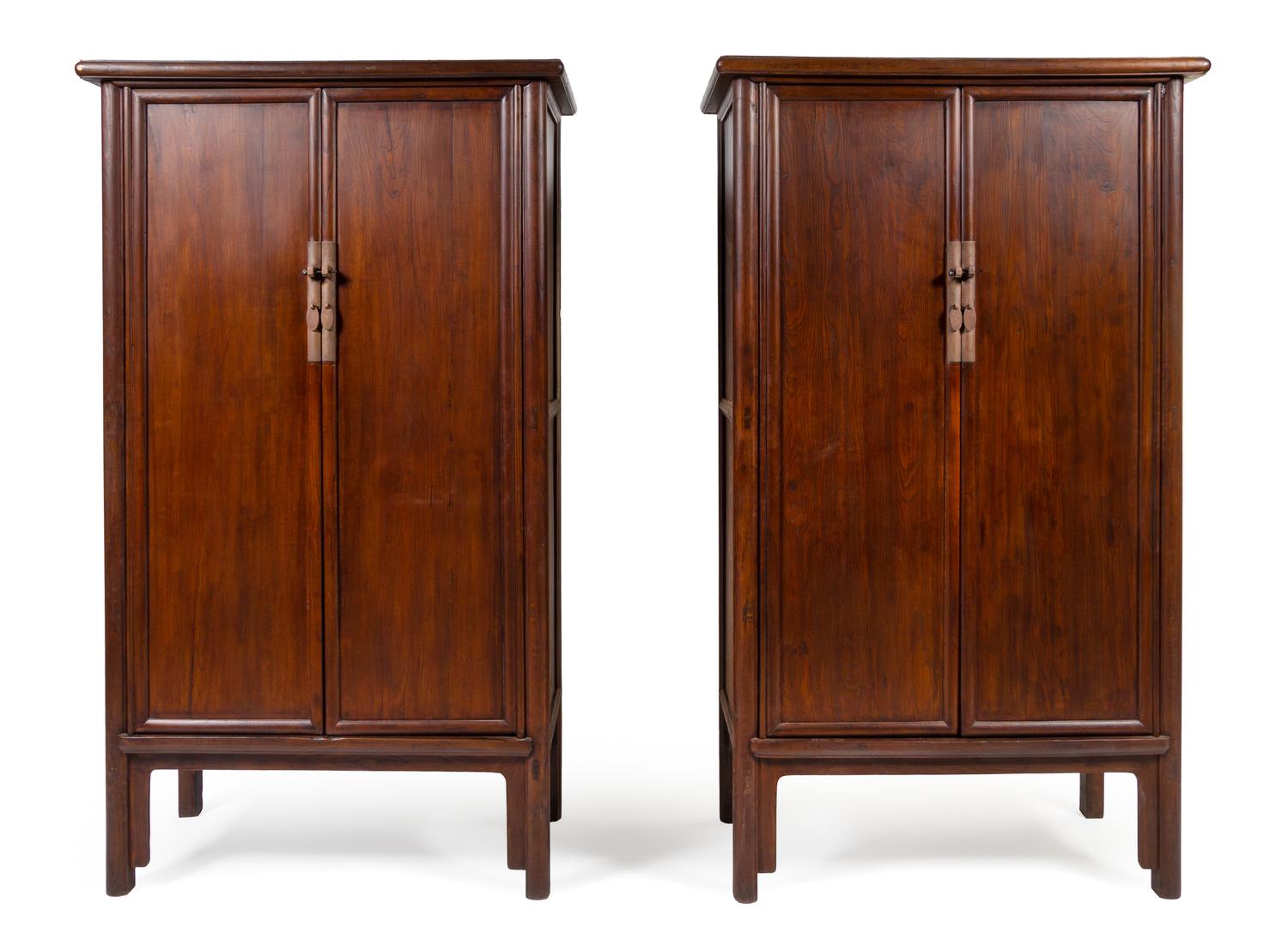 A Large Pair of Elmwood Cabinets, Yuanjiaogui Each height 88 x width 47 x depth 24 inches. — QING DYNASTY (1644-1911)