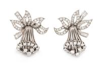 A Pair of Platinum and Diamond Daffodil Motif Earclips, 9.85 dwts.