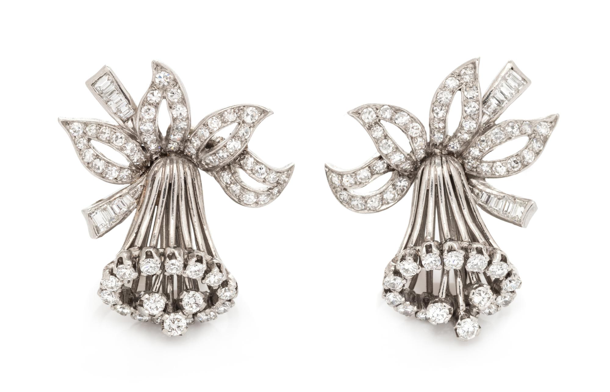 A Pair of Platinum and Diamond Daffodil Motif Earclips, 9.85 dwts.