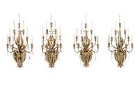 A Set of Four Gilt Bronze and Baccarat Glass Sconces
