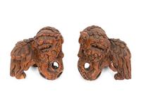 A Pair of Carved Wood Guardian Lions