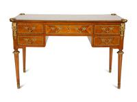 A Louis XVI Style Gilt-Bronze Mounted Mahogany Bureau Plat