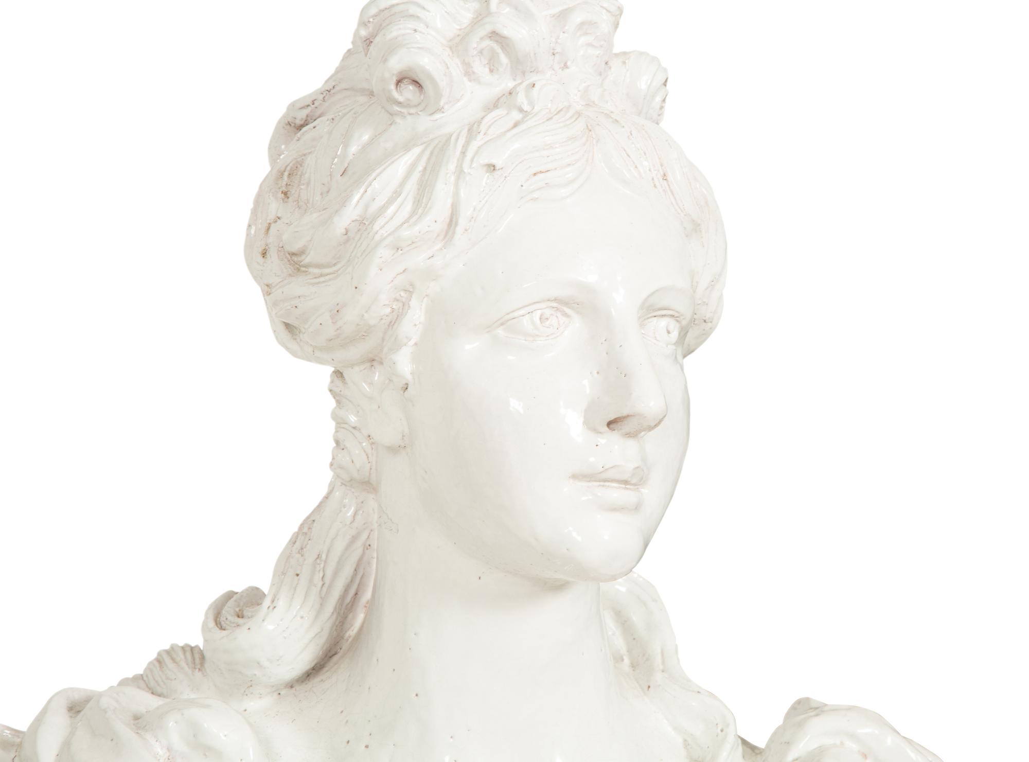 A Pair of Italian White Glazed Ceramic Busts on Pedestal Bases