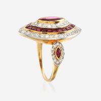 A ruby, diamond, and platinum topped gold ring