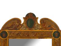 An Italian Neoclassical Polychrome Decorated and Parcel Gilt Mirror