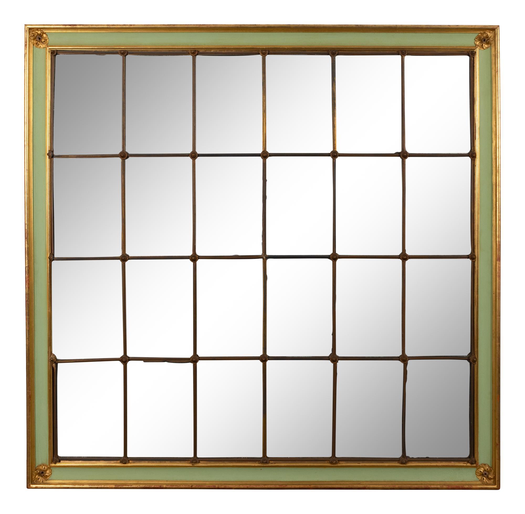 A Pair of Large Multi-Paned Mirrors in Painted Parcel Gilt Frames