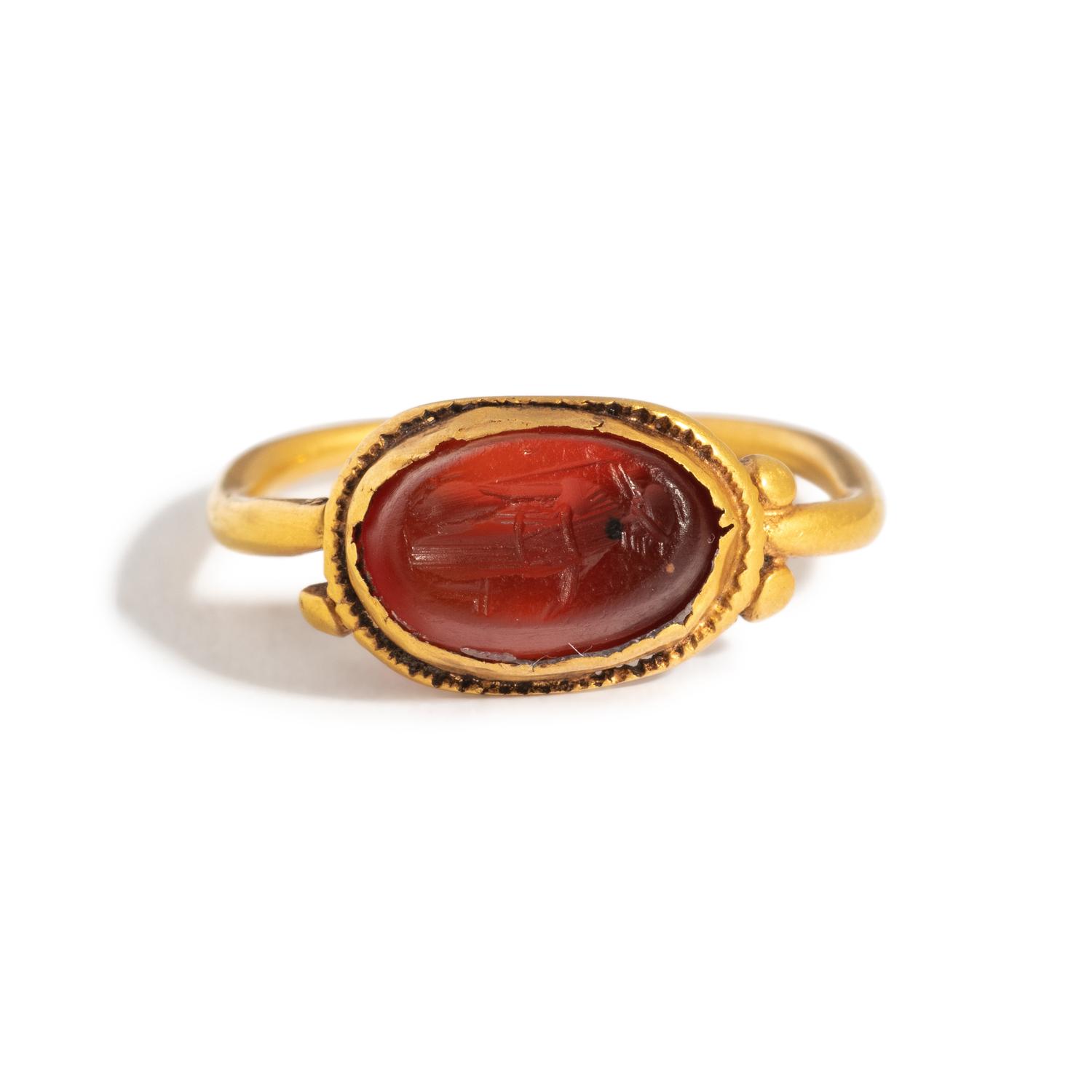 A Roman Gold and Carnelian Finger Ring with the Goddess Minerva