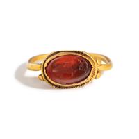 A Roman Gold and Carnelian Finger Ring with the Goddess Minerva