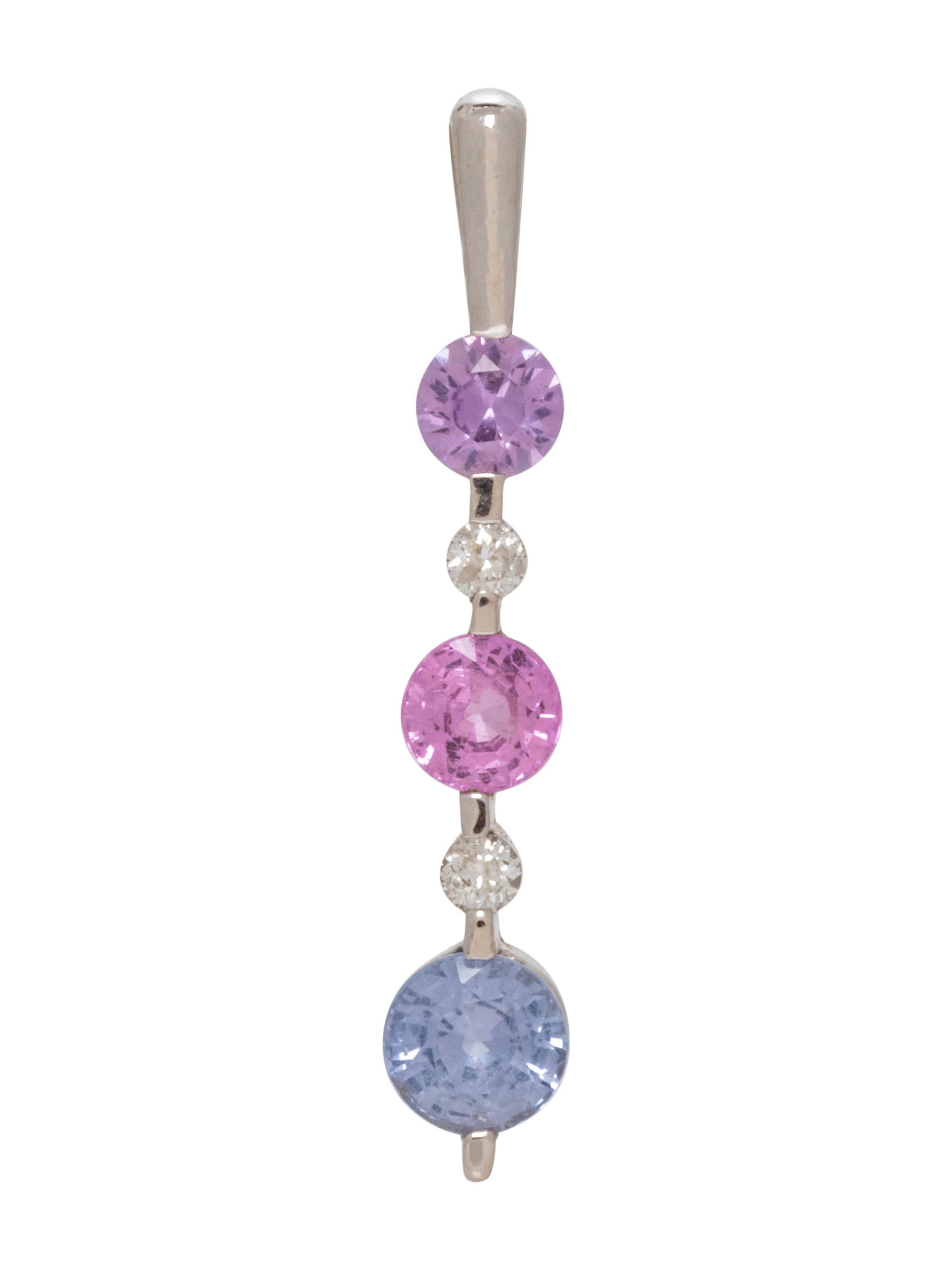 A 14 Karat White Gold, Sapphire and Diamond Pendant,