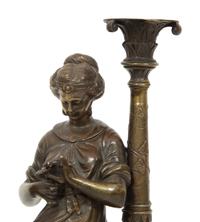 A Pair of French Bronze and Marble Figural Candlesticks
