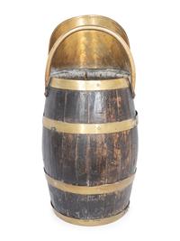 An English Brass Mounted Oak Jug