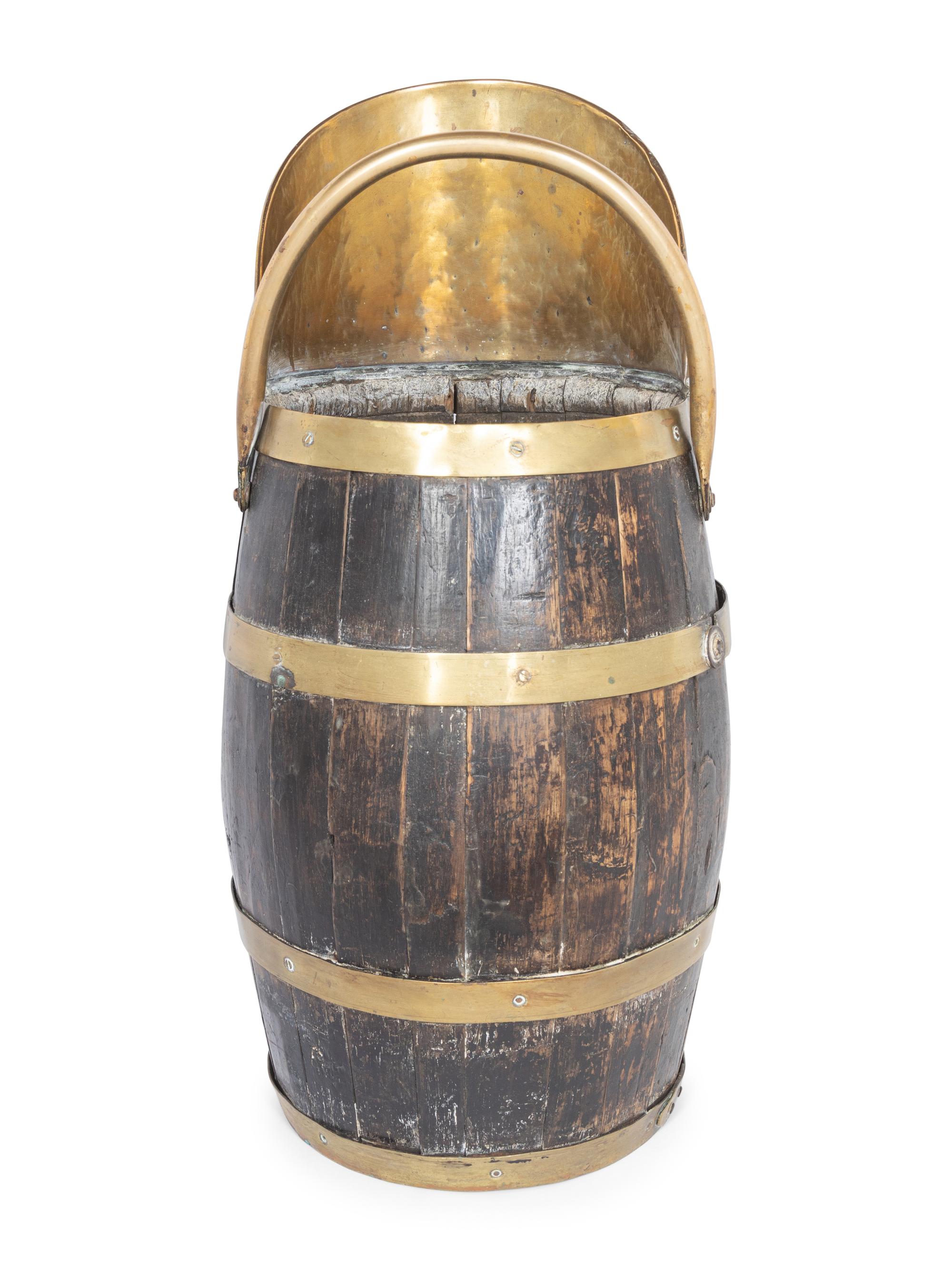 An English Brass Mounted Oak Jug