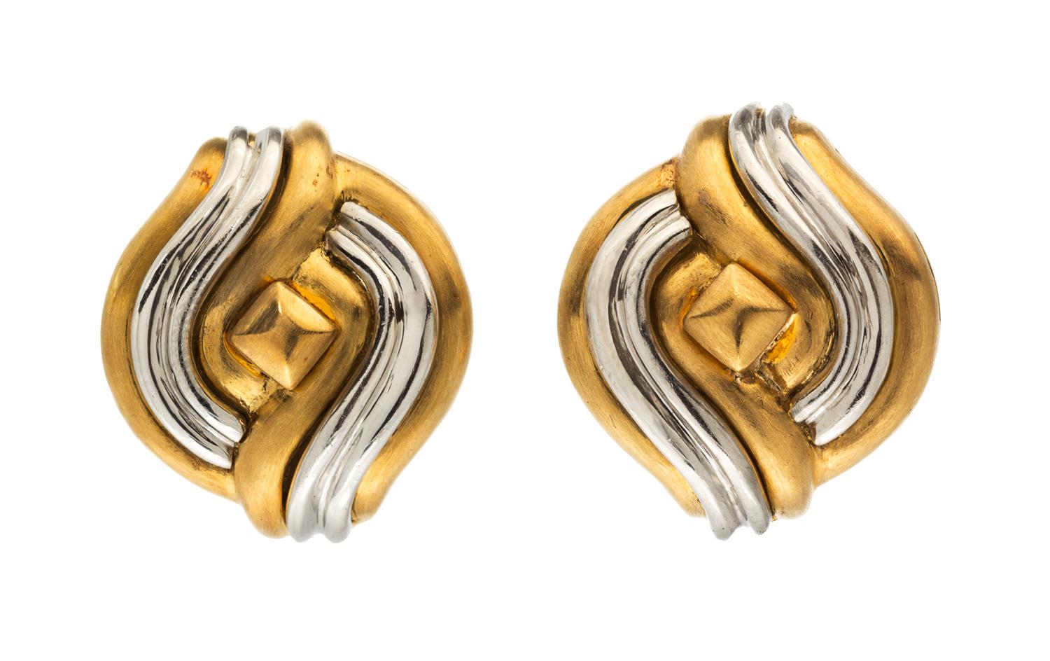 A Pair of 18 Karat Yellow Gold and Platinum Textured Earclips, 20.70 dwts.