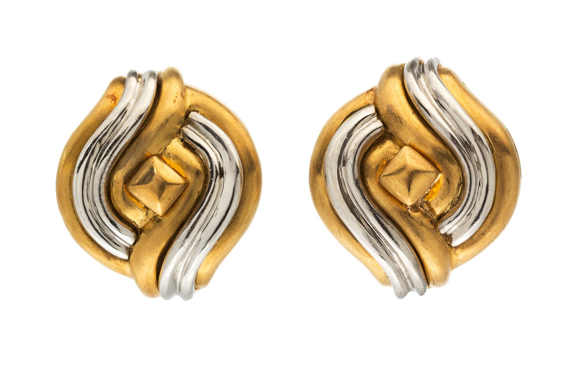 A Pair of 18 Karat Yellow Gold and Platinum Textured Earclips, 20.70 dwts.