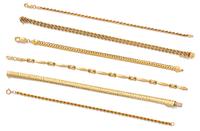 A Collection of 14 Karat Yellow Gold Chain Bracelets,