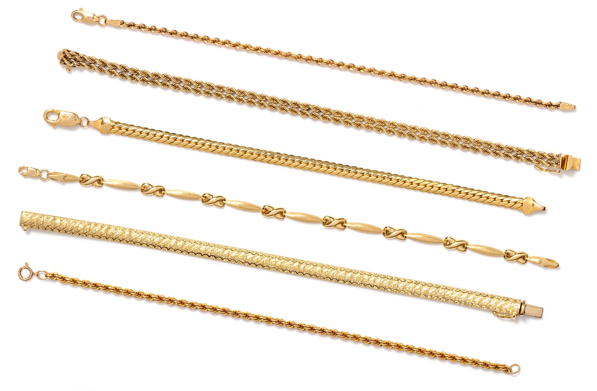 A Collection of 14 Karat Yellow Gold Chain Bracelets,
